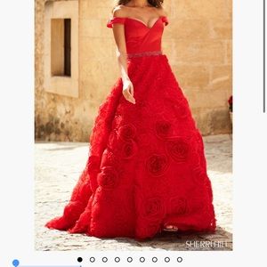 Red Sherri Hill off the shoulder ballgown with roses on gown